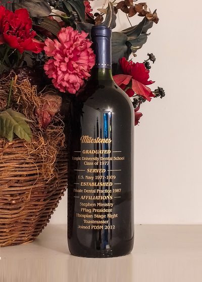 Etched wine bottle with milestones